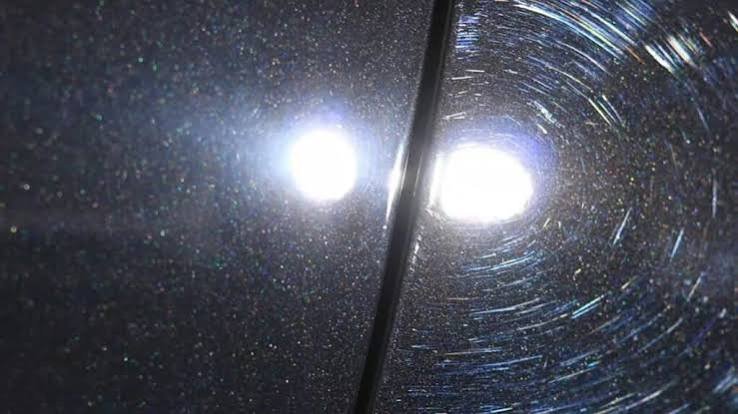 Light swirl marks on paint beside a clean film-protected panel